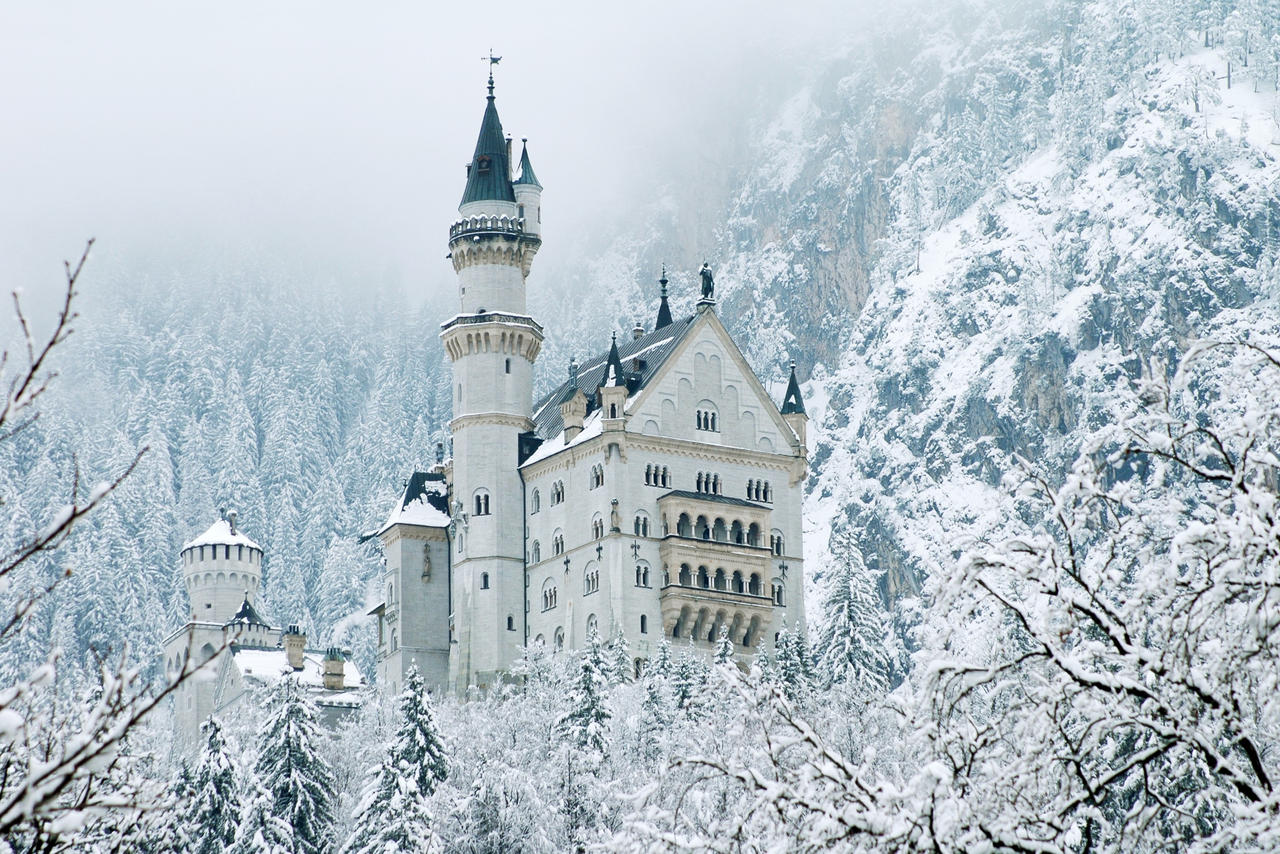 Neuschwanstein Castle in the snowy mountains