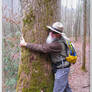 Ricardo Hugging Trees on West Prong Trail