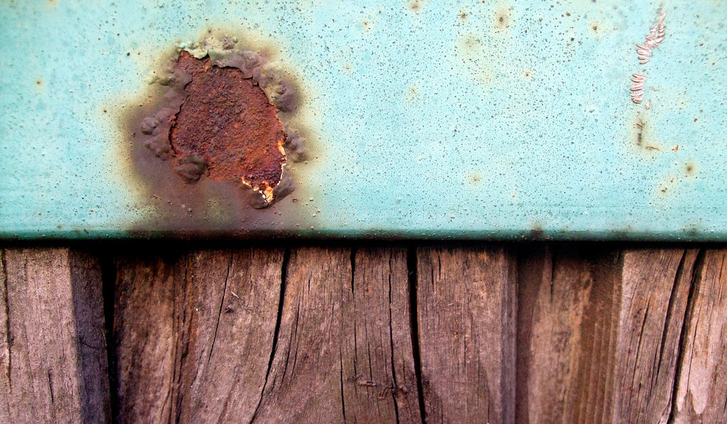 Blue paint, rusty stain and wood texture