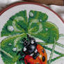 Ladybug in cross stitch