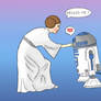 Princess Leia (Carrie Fisher) reuniting with R2D2