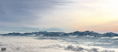 Winter sky above the clouds