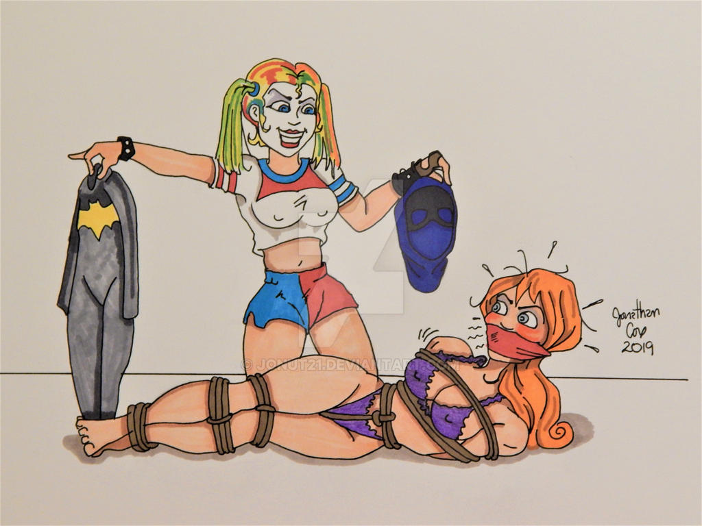 Harley Quinn menacing Batgirl