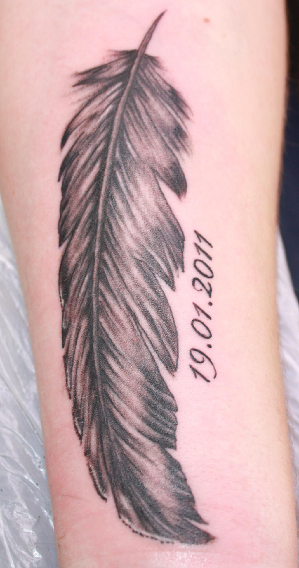 tattoo-feather Peters Tattoostudio