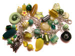 Green + yellow charm bracelet by fairy-cakes