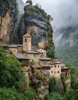 Village under cliff at island Millures