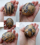 Dragon face decorated egg by Drerika