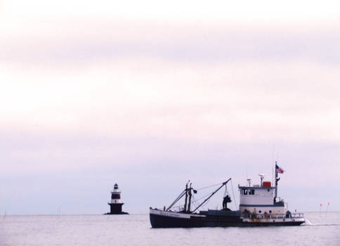 Boat and lighthouse