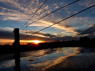 Sunset, Fence and Trough by KiwiTakeFlight