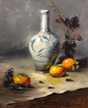 Vase and persimmons
