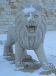 Stone Lion Statue in the Snow