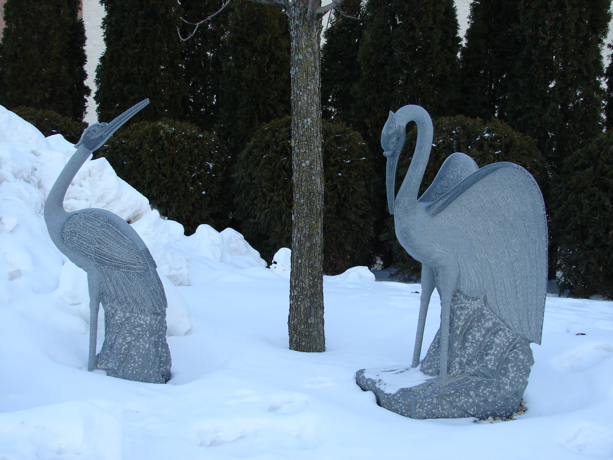 Two Crane Statues in the Snow