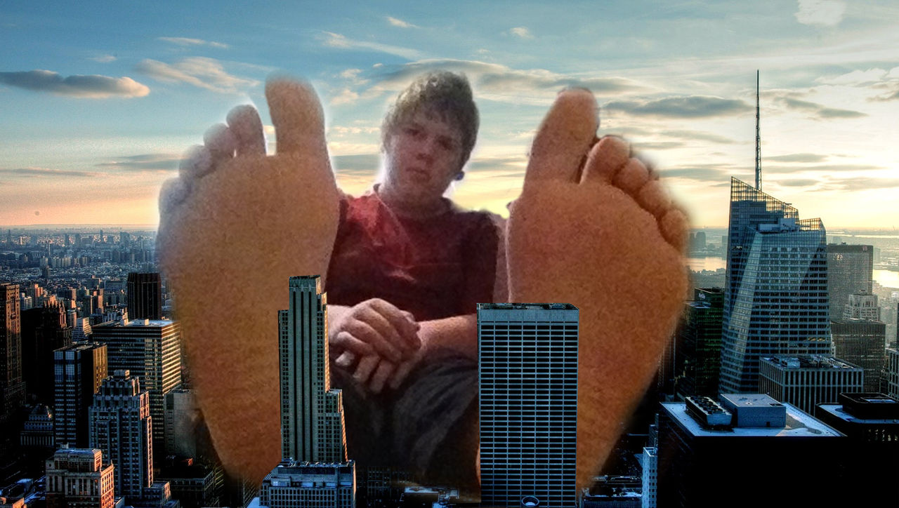 Giant Michael sitting on NYC by colossal-mick on DeviantArt