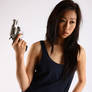 Gorgeous Asian Holding A Gun
