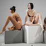 A female figure sitting on a box
