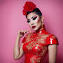 Thai drag queen wearing a red latex cheongsam dres