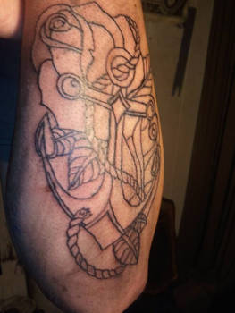 Anchor and rose tattoo