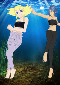 Aqua and Winry freediving underwater