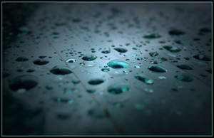 Raindrop on car window