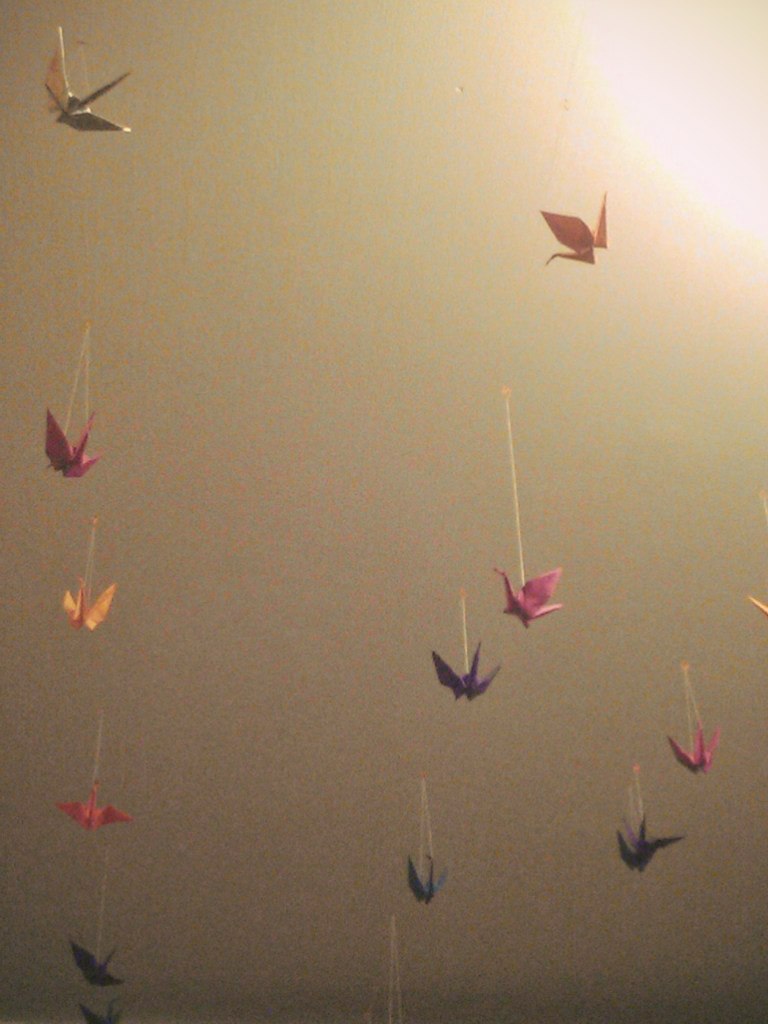 paper cranes on the ceiling in my room