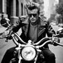 JAMES DEAN RIDING A HARLEY DAVIDSON MOTORCYCLE.