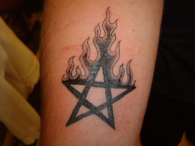 Pentagram with flames