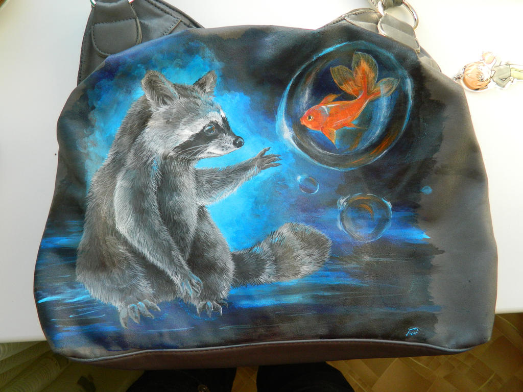 raccoon  and goldfish