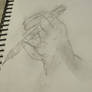 draw your drawing hand while drawing it