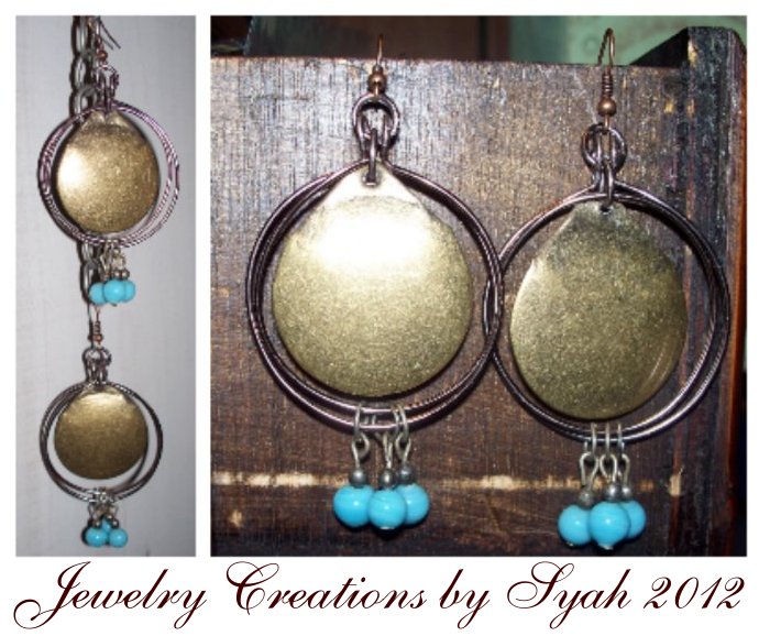 Brass tone disc earrings with blue glass beads
