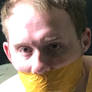 Old photo tape gagged 3