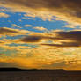 The Golden And Blue Cloudy Sky