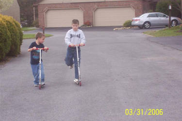 Brothers on Scooters