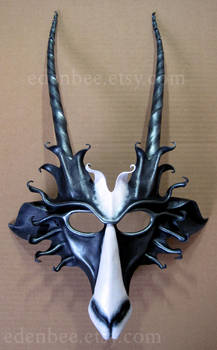 Goat mask in black, white, and pewter