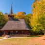 Old wooden church at the edge of the graying fores