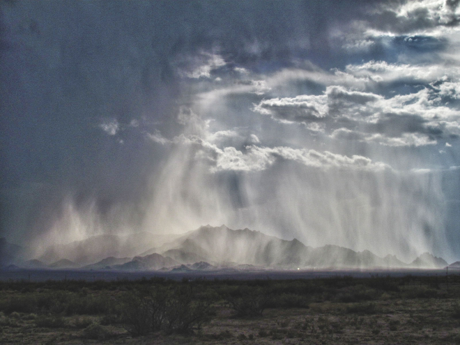 Rain Storm Over The Mountains