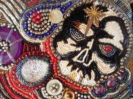 Bead embroidered skull purse