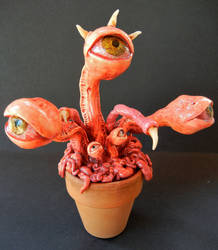 Polymer clay eyeball plant monster