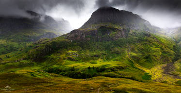 The rain swirls about the skyline crags.