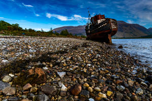 Stranded on the shore.