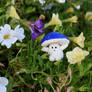 Shroom in the flowers