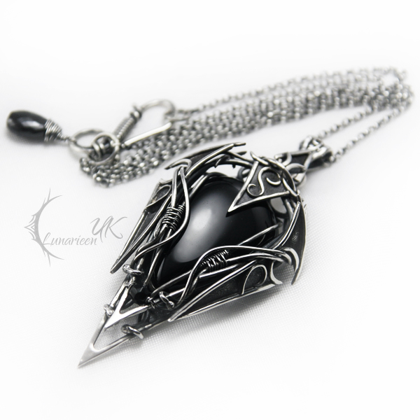 LAUNTROX - silver , black onyx and spinel