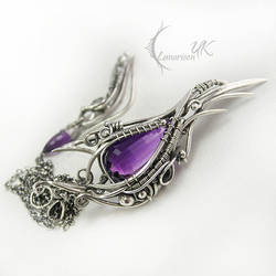 ARVINTIEEL - silver and amethyst.