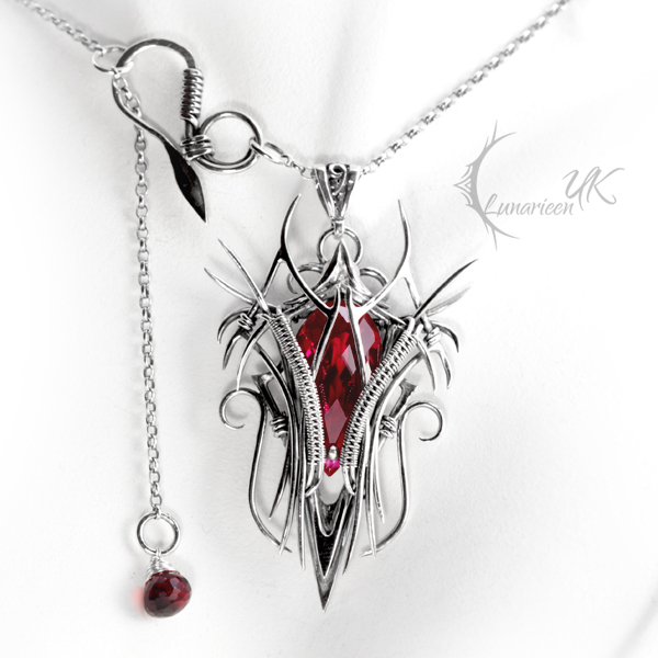 XEENTYRN - silver and red quartz