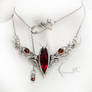 ASSAVILRX - silver , topaz , garnet.