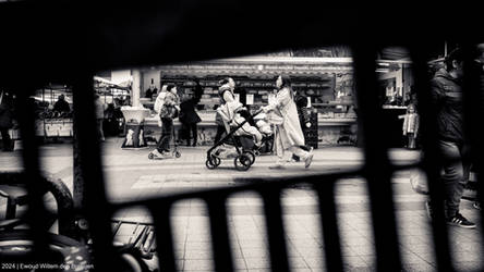 Marketstand shot through bicycle basket