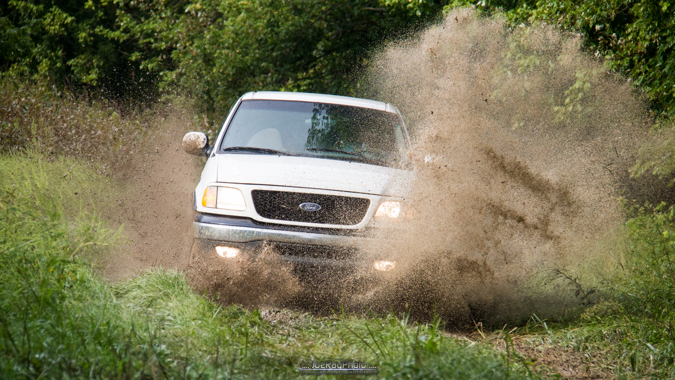 White F-150 in the Mud