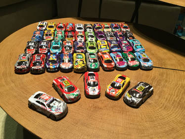 AN ENTIRE COLLECTION OF PULL BACK CARS!