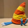 A plush of Willow hiding inside her hat