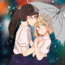 Two girls under umbrella