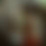A young Indian village woman in a midriff-baring o